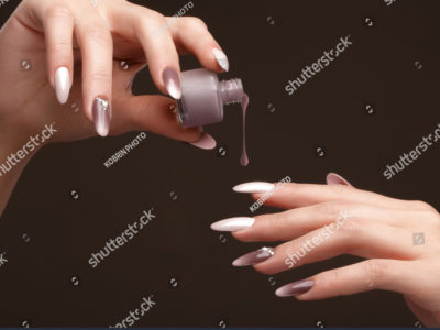 stock-photo-beautiful-classic-manicure-on-female-hand-with-nail-polish-close-up-picture-taken-in-the-studio-1116855872